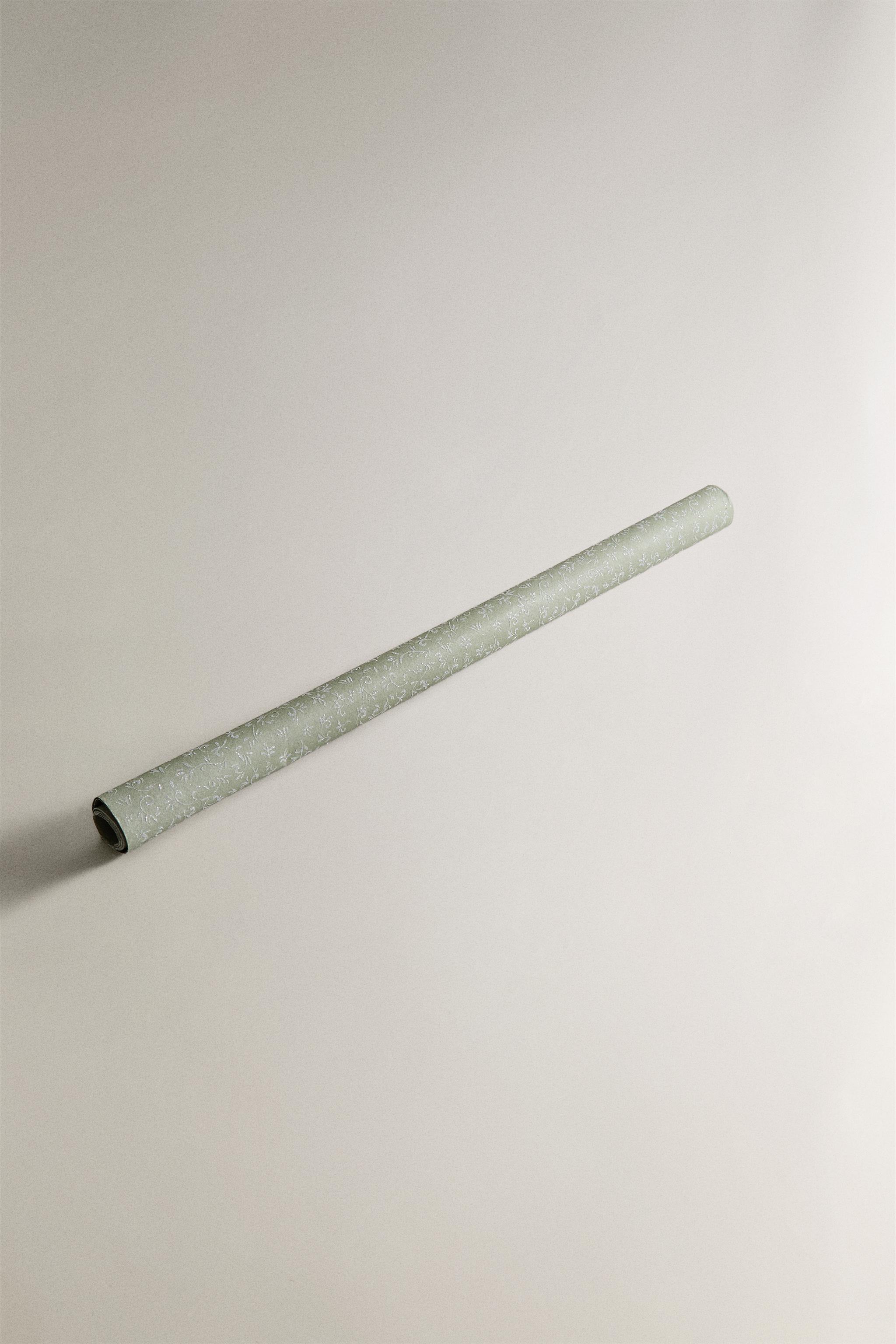 PAPIER CADEAU FEUILLES PAILLETTÉES NOËL